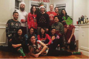 Group of students in holiday sweaters