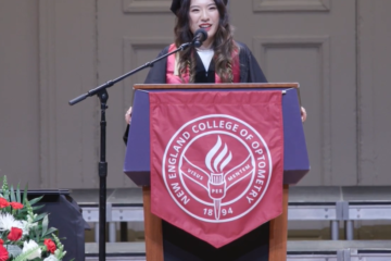 Valedictorian Sharon Qiu speaking at commencement